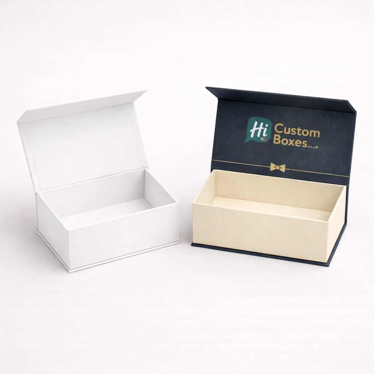 Two rectangular flip-top gift boxes shown open- featuring a plain white and a navy design- class=